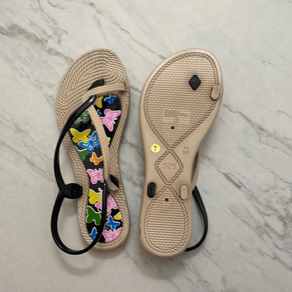 Cute sandals with colored butterflies